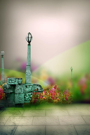 Mystical Ancient Stone Lamp Post in a Dreamy Garden with Pink Flowers HD phone wallpaper