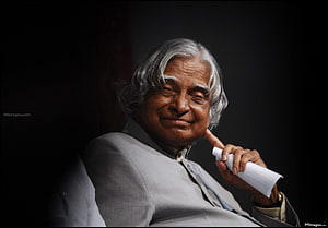 A.P.J. Abdul Kalam Portrait in Light Grey Suit with Rolled Paper HD wallpaper