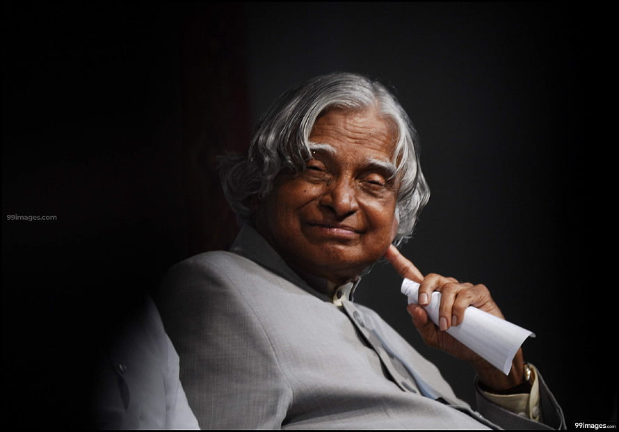 A.P.J. Abdul Kalam Portrait in Light Grey Suit with Rolled Paper HD wallpaper