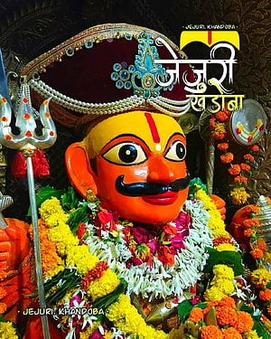 Jejuri Khandoba Hindu Deity Statue With Trishul And Flower Garlands HD phone wallpaper