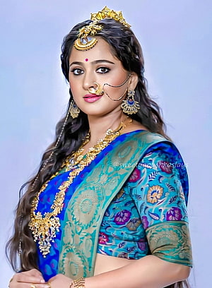 Anushka Shetty in Traditional Blue Saree with Gold Jewelry HD phone wallpaper