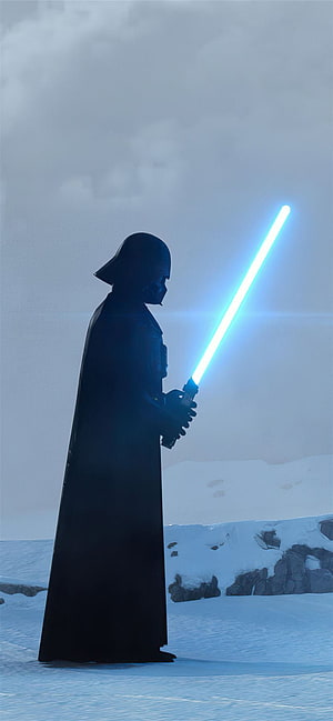 Darth Vader holding a blue lightsaber in a snowy landscape from Star Wars The Clone Wars HD phone wallpaper