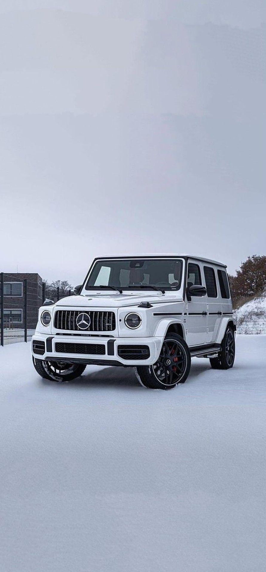 White Mercedes-AMG G63 SUV Parked in Snowy Winter Landscape HD phone wallpaper