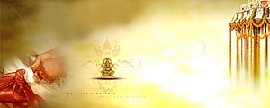 Traditional Indian Wedding Ceremony with Ganesha Idol and Floral Decorations HD wallpaper