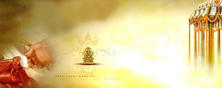 Traditional Indian Wedding Ceremony with Ganesha Idol and Floral Decorations HD wallpaper