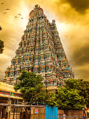 Vibrant Dravidian Gopuram Temple Tower With Intricate Sculptures Under Golden Sky HD phone wallpaper