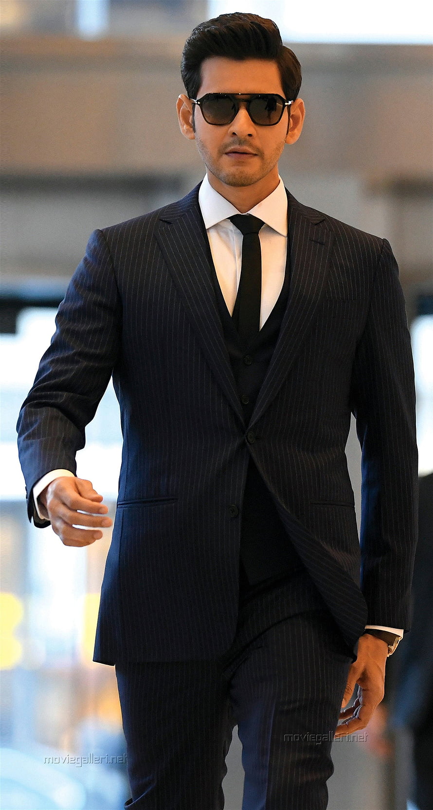 Mahesh Babu in a sharp navy pinstripe three-piece suit with sunglasses HD phone wallpaper
