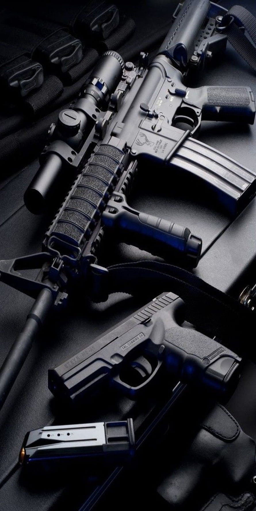 Tactical AR-15 Rifle and Glock 19 Pistol with Scope and Magazine on Dark Surface HD phone wallpaper