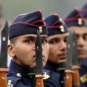 Indian Military Cadets in Formal Dress Uniforms Holding Bayonets During a Ceremony HD phone wallpaper