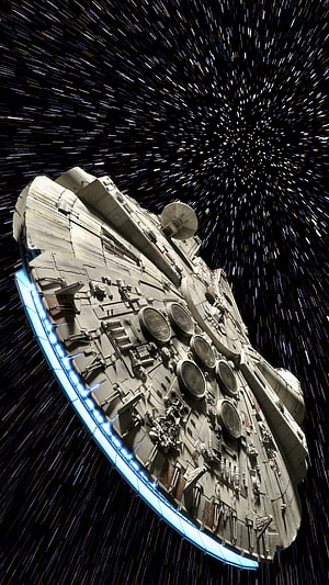 Millennium Falcon Starship in Hyperspace with Blue Engine Glow and Star Streaks HD phone wallpaper