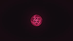 Glowing Rinnegan Eye Symbol on Dark Background from Naruto Anime Series HD wallpaper