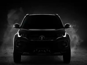 Tata Nexon Dark Edition Front View in Dramatic Black and White Smoke HD wallpaper