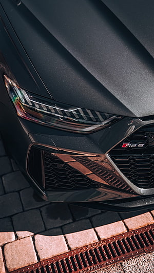 Audi RS6 e-tron Front Fascia Close-Up with Matte Black Finish and LED Headlights HD phone wallpaper