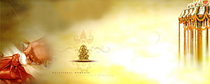 Traditional Indian Wedding Ceremony with Golden Ganesha Idol and Decorative Mandap HD wallpaper