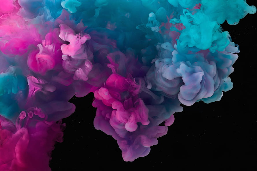 Vibrant Pink and Cyan Ink Swirls Diffusing in Water on Black Background HD wallpaper