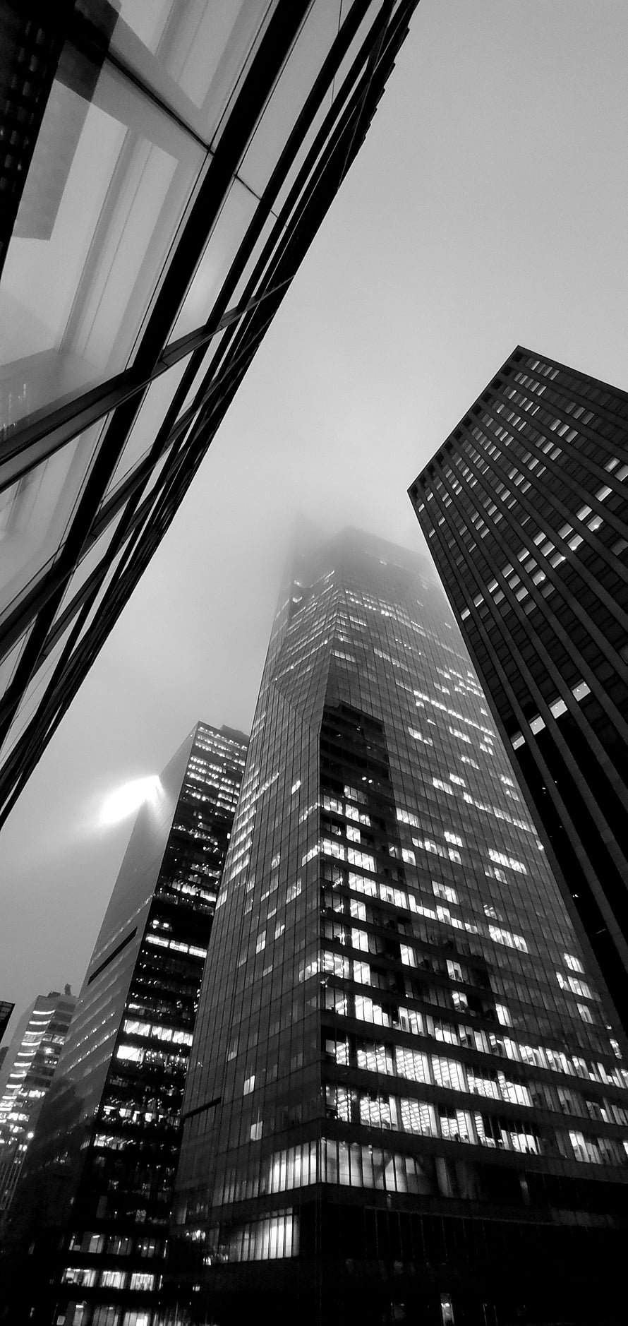 Monochrome New York City Skyscrapers Rising Through Dense Morning Fog HD phone wallpaper