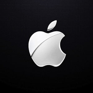 Glossy White Apple Logo on Dark Textured Background HD phone wallpaper