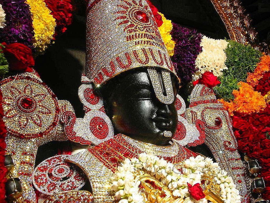 Ornate Black Stone Idol of Lord Ayyappa Adorned with Jewels and Flowers HD wallpaper