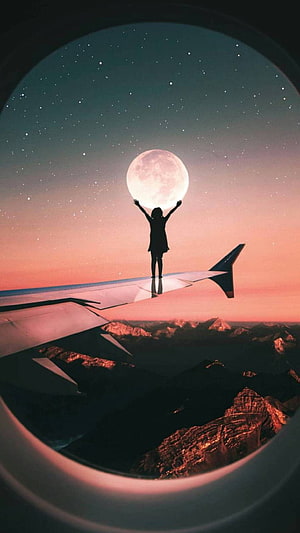 Silhouette of Girl Holding Giant Moon on Airplane Wing at Sunset HD phone wallpaper
