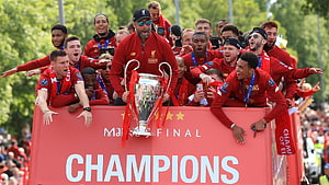 Liverpool FC Players Celebrate Champions League Victory on Victory Bus HD wallpaper