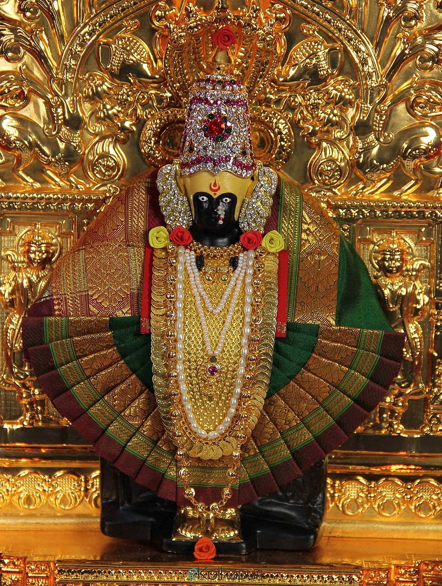 Ornate Mahalaxmi Deity Idol Adorned in Gold Jewelry and Traditional Silk Garments HD phone wallpaper