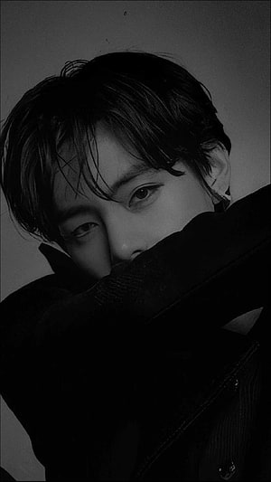 Black and white portrait of a young man with dark hair looking over a raised collar, Bts V posted by Ryan Peltier, bts v black HD phone wallpaper