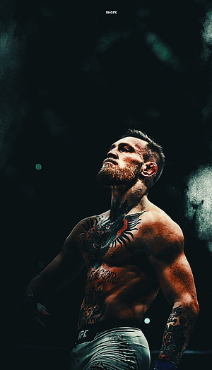 Conor McGregor UFC Fighter Portrait with Tattoos and Intense Gaze HD phone wallpaper