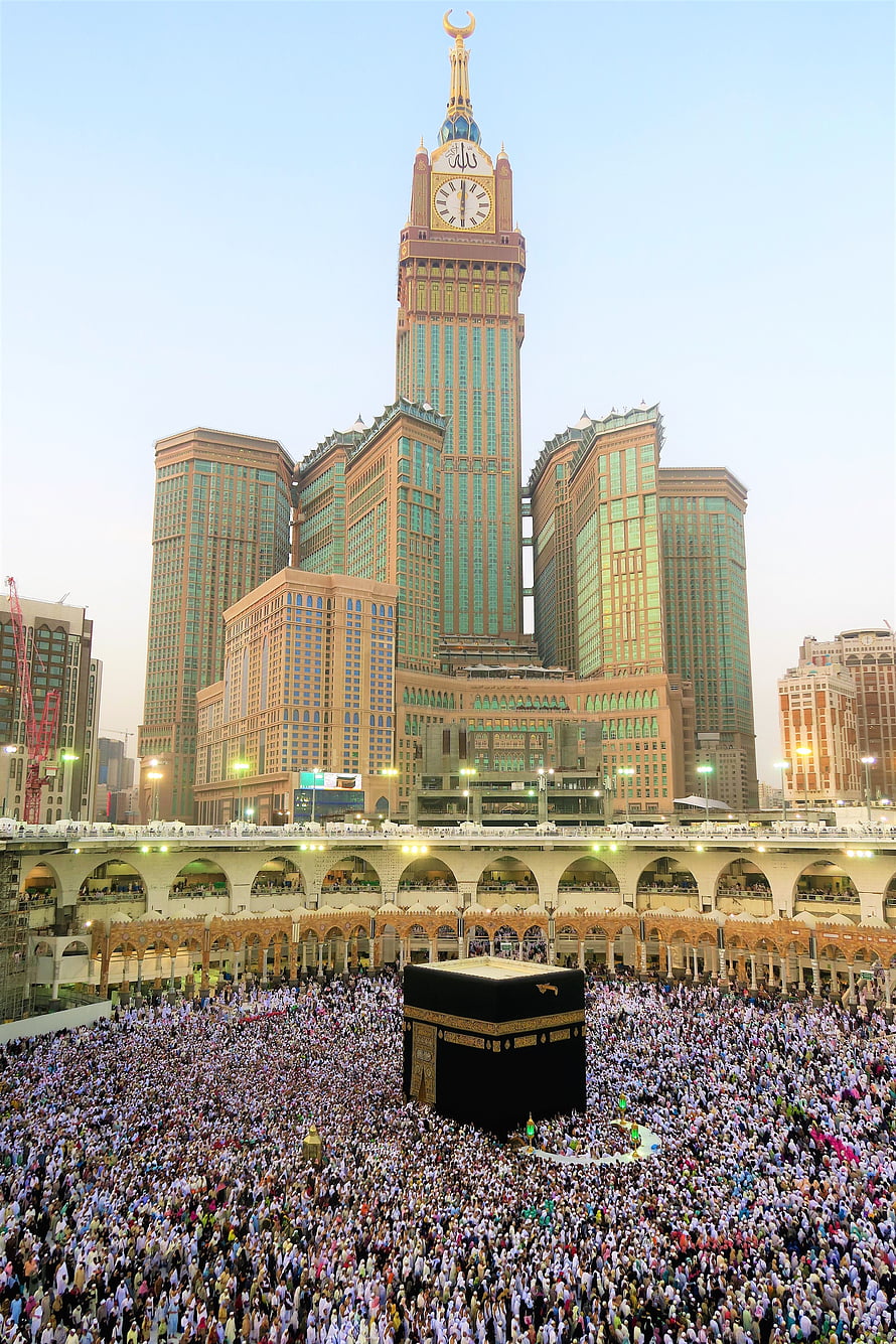 Massive Pilgrimage at the Kaaba in Mecca with Abraj Al-Bait Clock Tower Rising Behind the Sacred Site HD phone wallpaper