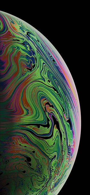 Vibrant Abstract Soap Bubble With Swirling Green, Blue, And Pink Colors On Black Background HD phone wallpaper