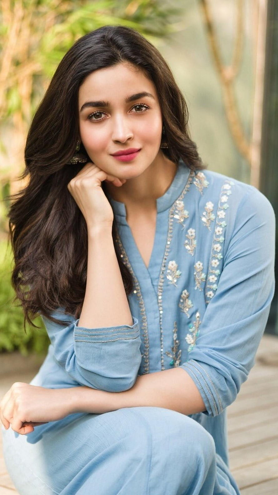 Alia Bhatt in a light blue embroidered kurta posing outdoors with a gentle smile HD phone wallpaper