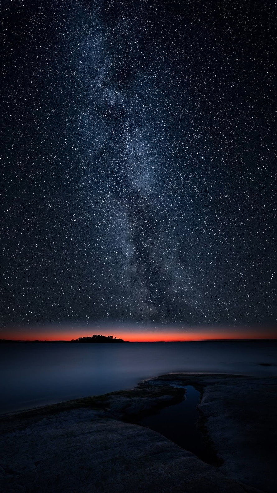 Milky Way Galaxy Over Calm Ocean With Orange Horizon Glow HD phone wallpaper