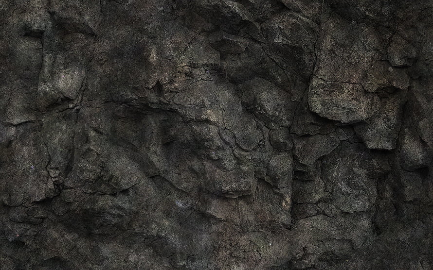 Dark Cracked Stone Surface with Rough Natural Rock Texture and Deep Gray Tones HD wallpaper