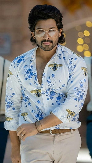 Allu Arjun in floral bee print shirt and aviator sunglasses from Pushpa HD phone wallpaper