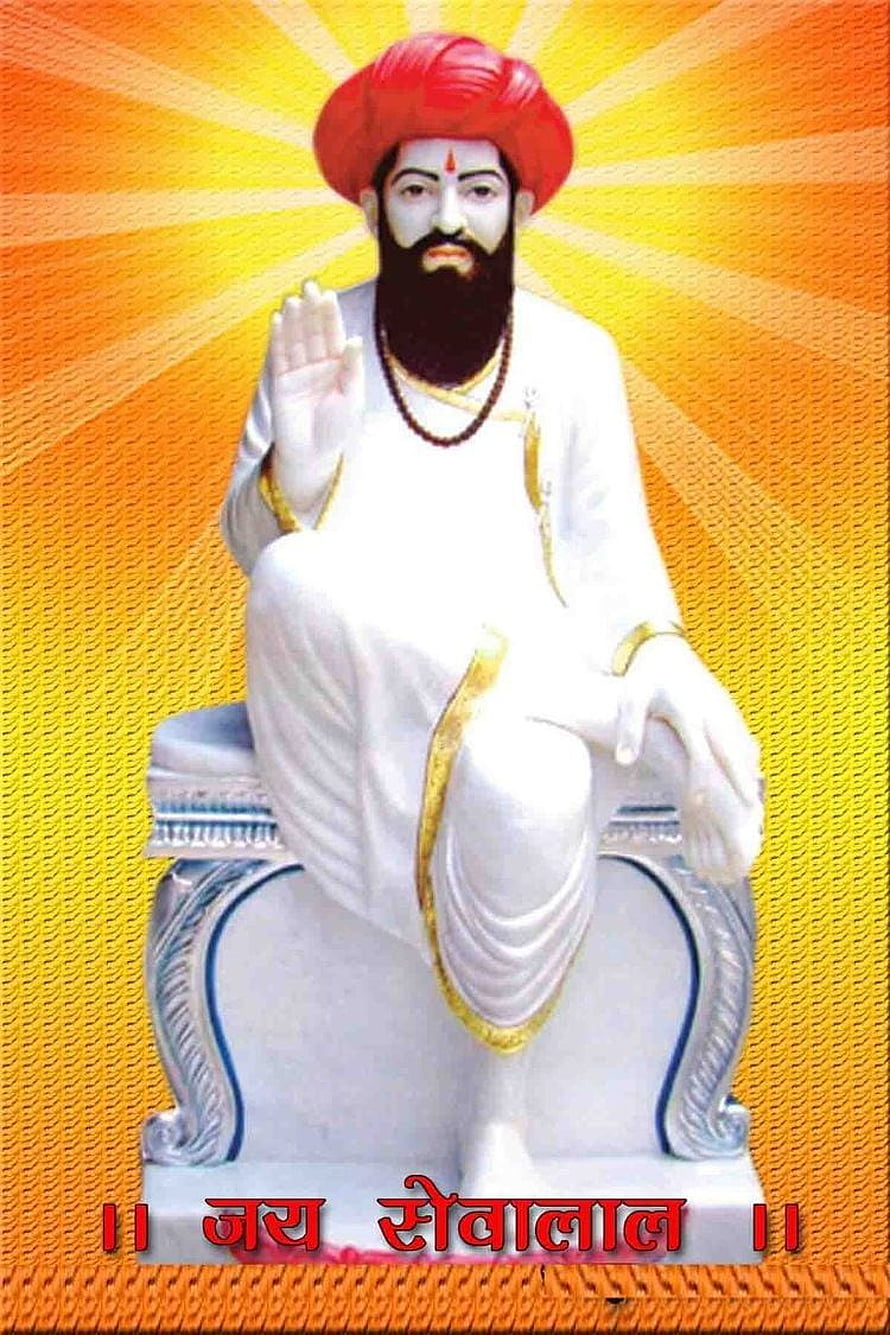 Sevalal Maharaj Statue in White Robes and Red Turban with Radiant Golden Background HD phone wallpaper