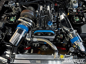 Polished 2JZ Engine Bay With Blue Accents And Chrome Intake Components HD wallpaper