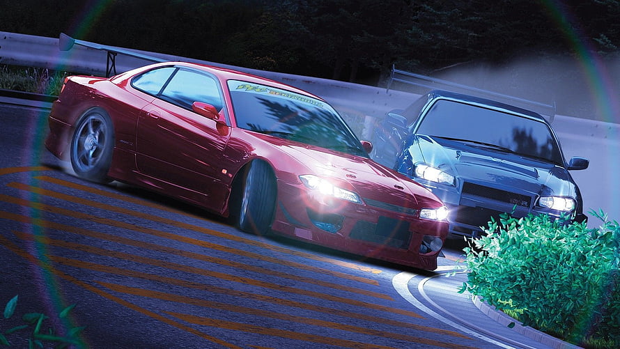 Red Nissan Silvia S15 and Blue Nissan Skyline GT-R R34 drifting on a winding mountain road at night HD wallpaper