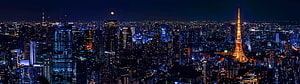 Tokyo Skyline at Night with Tokyo Tower and Full Moon Over the City HD wallpaper