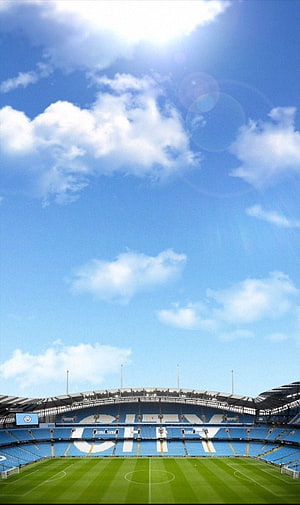 Etihad Stadium Manchester City Home Ground Under Bright Blue Sky HD phone wallpaper