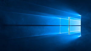 Windows 10 Default Blue Light Window Logo on Dark Background HD wallpaper