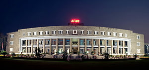 Armed Forces Medical College Pune Night View with Illuminated AFMC Sign HD wallpaper