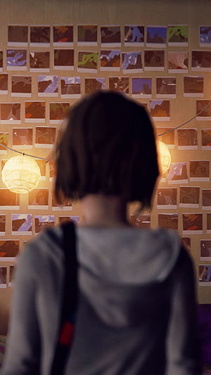 Life Is Strange Aesthetic Scene With Character Viewing Polaroid Wall Under Warm Lantern Light HD phone wallpaper