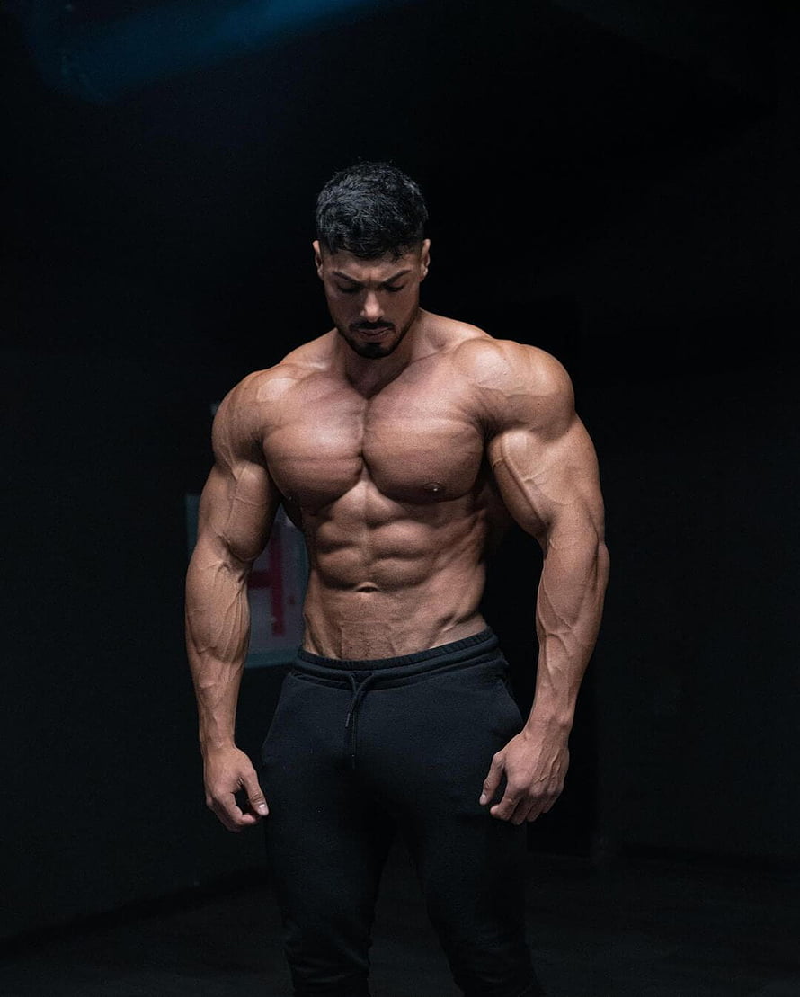 Aadesh Bhoir Muscular Physique Portrait in Dark Studio Setting HD phone wallpaper