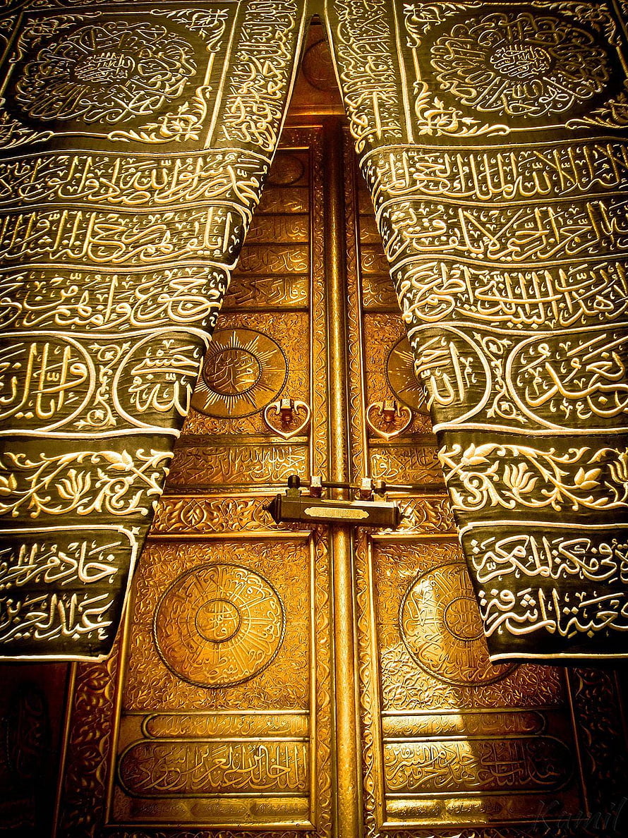 Golden Islamic Calligraphy Doors with Intricate Arabic Script and Ornate Metalwork HD phone wallpaper