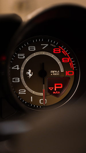 Ferrari Tachometer Close-Up with Redline and Prancing Horse Emblem HD phone wallpaper