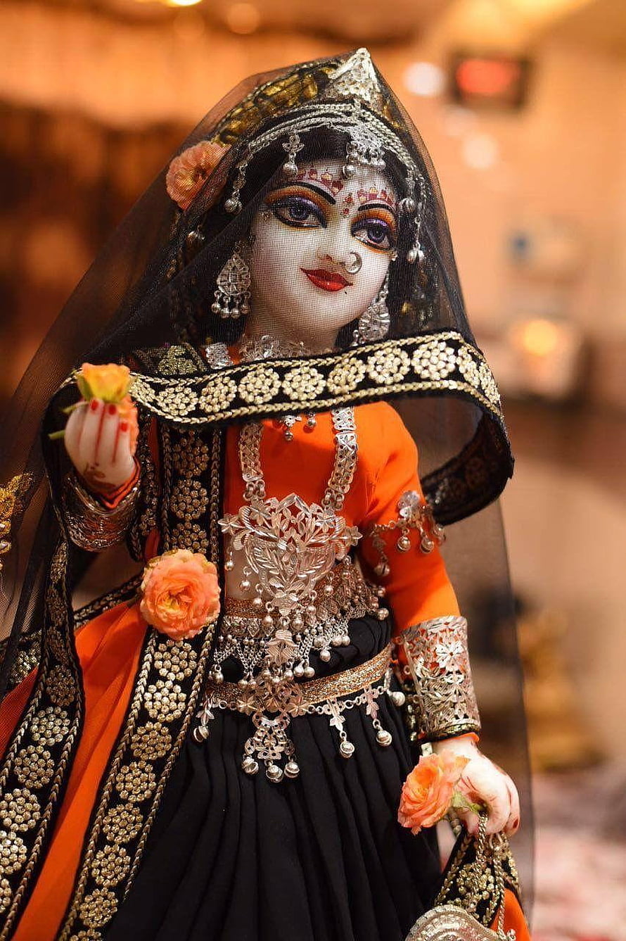 Traditional Indian Doll in Black and Orange Attire with Silver Jewelry HD phone wallpaper