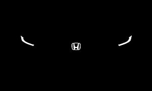 Minimalist Honda Civic Front Fascia with Sleek LED Headlights on Black Background HD wallpaper