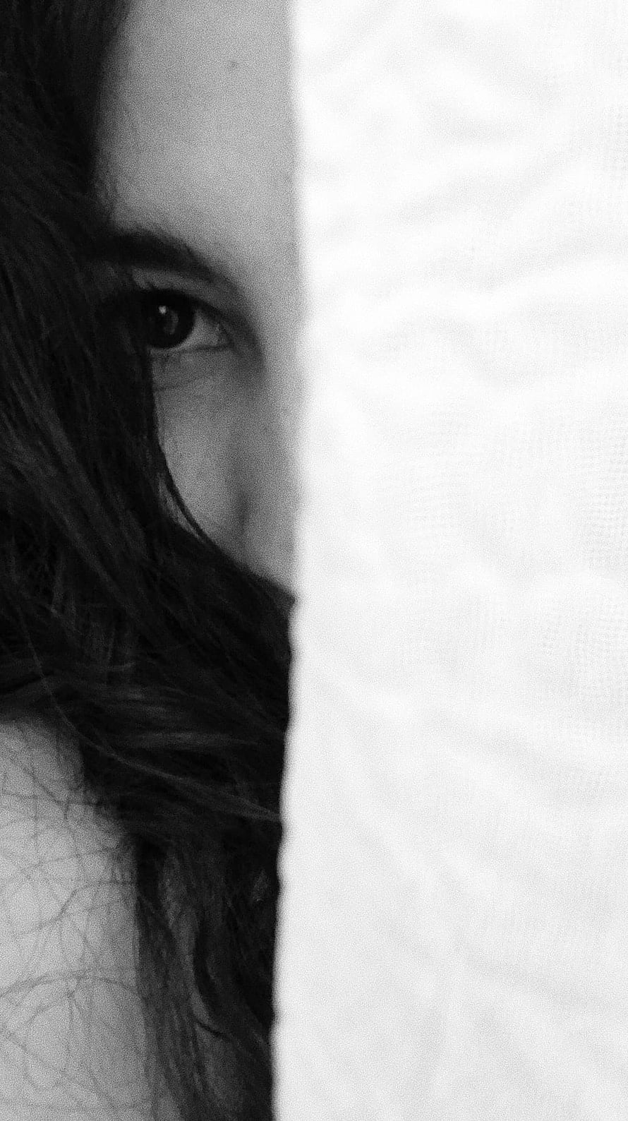 Black and White Portrait of a Woman Peeking From Behind a White Wall, Hide Face, girls hidden dp HD phone wallpaper