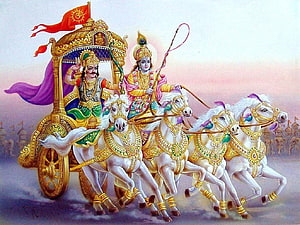 Krishna and Arjuna on a Golden Chariot with White Horses in the Mahabharata HD wallpaper