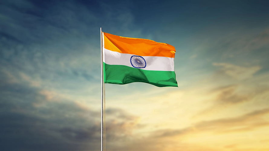 Indian National Flag Waving Against a Dramatic Sunset Sky HD wallpaper