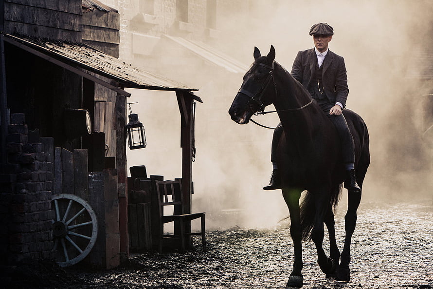 Thomas Shelby on Horseback in Misty Industrial Setting from Peaky Blinders HD wallpaper